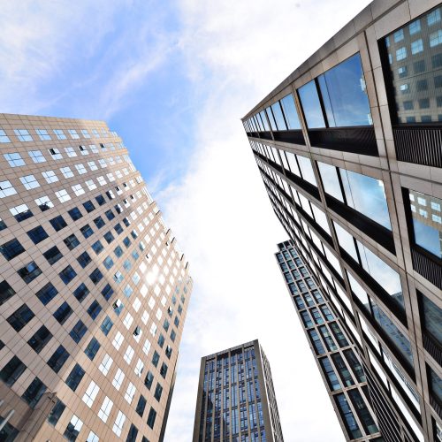 Looking up at business buildings in downtown New York, USA